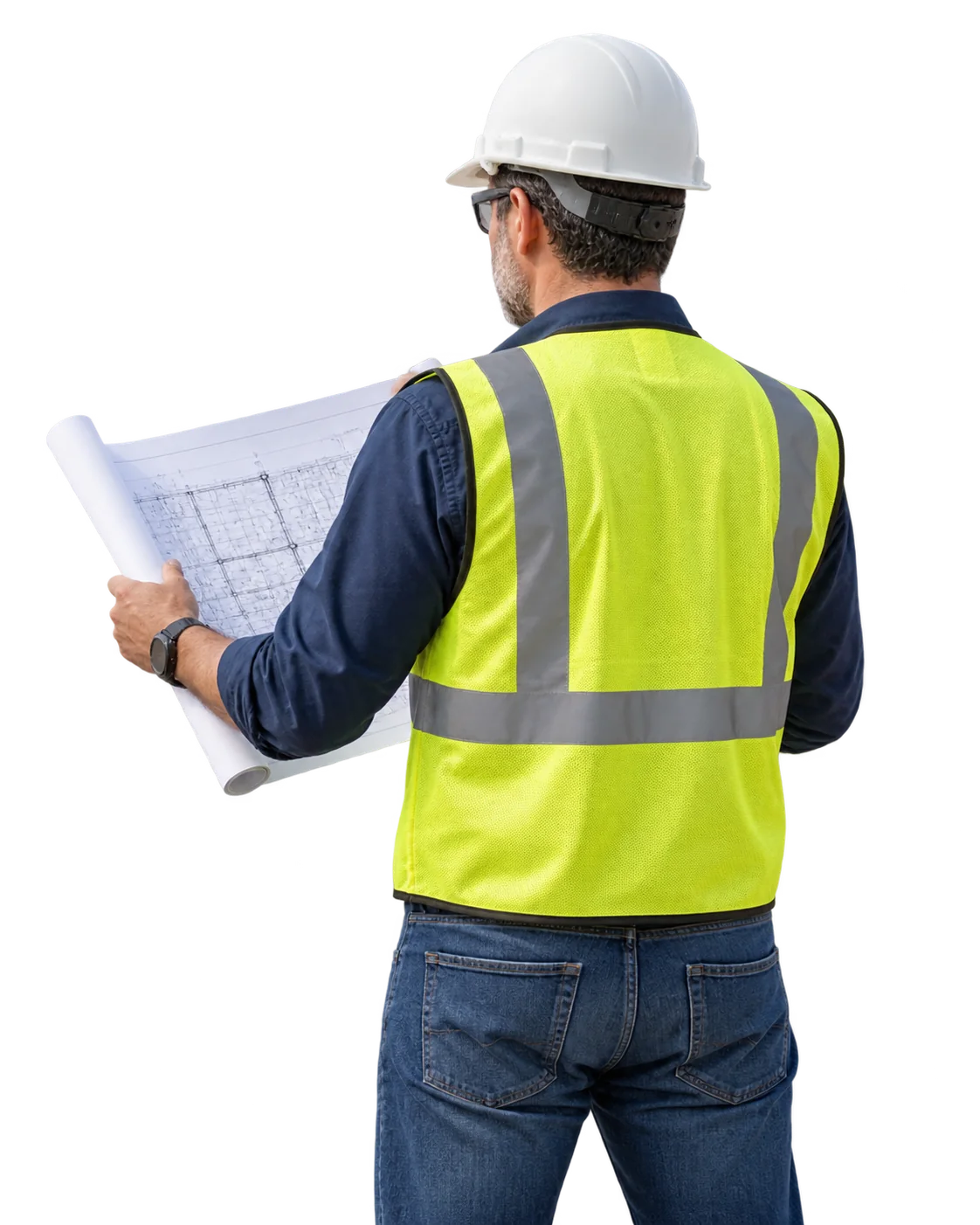 Structural engineer reviewing construction blueprints on a project site